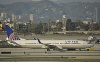 N38443 @ KLAX - Taxiing to gate - by Todd Royer