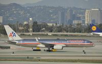 N194AA @ KLAX - Taxiing to gate - by Todd Royer