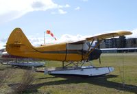 CF-GYF @ CAH3 - Stinson 108-2 Flying Station Wagon on floats at Courtenay Airpark, Courtenay BC