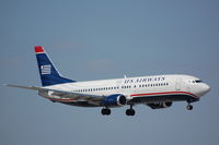 N438US @ KFLL - US B734 landing in FLL - by FerryPNL