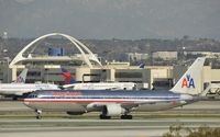N389AA @ KLAX - Taxiing to gate - by Todd Royer