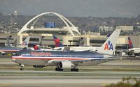 N328AA @ KLAX - Taxiing to gate - by Todd Royer
