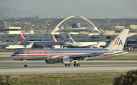 N697AN @ KLAX - Taxiing to gate - by Todd Royer