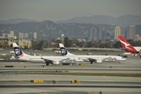 N536AS @ KLAX - Taxiing to gate - by Todd Royer