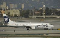 N788AS @ KLAX - Taxiing to gate - by Todd Royer