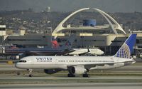 N586UA @ KLAX - Taxiing to gate - by Todd Royer