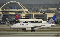 N806UA @ KLAX - Taxiing to gate - by Todd Royer