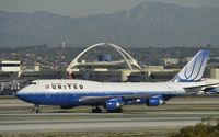 N122UA @ KLAX - Taxiing to gate - by Todd Royer