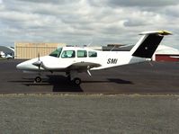 ZK-SMI @ NZAR - Lounging around in the sun. - by magnaman