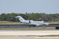 N916QS @ KSRQ - Execjet Flight 916 (N916QS) arrives at Sarasota-Bradenton International Airport following a flight from Miami International Airport - by Donten Photography