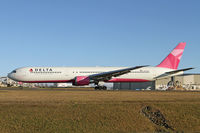 N845MH @ PAE - Delta's Breast Cancer Research Foundation painted B,767-400 departs Paine Field on a very chilly winter's day. Delta uses PAE for maintenance - by Duncan Kirk