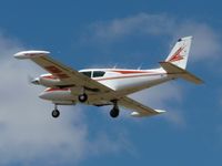 VH-MEG @ YBSS - Twin Comanche VH-MEG departing Rwy 09 at Bacchus Marsh