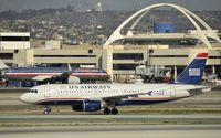 N114UW @ KLAX - Taxiing to gate - by Todd Royer