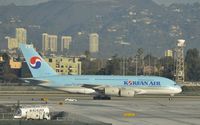 HL7611 @ KLAX - Taxiing to gate - by Todd Royer