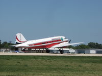 N728G @ KOSH - Landing runway 09 - by steveowen