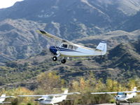 N3039E @ SZP - 1946 Aeronca 7AC CHAMPION, Continental O-200 100 Hp per STC, climbout after touch & go Rwy 04R grass - by Doug Robertson