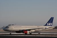 OY-KAM @ CPH - A320 of SAS arriving in CPH on r/w 04L - by Erik Oxtorp