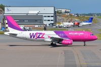 HA-LPI @ ENTO - Wizz A320 for departure at Torp - by FerryPNL