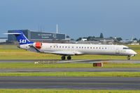 OY-KFG @ EKCH - Take off for SAS CL900 at CPH - by FerryPNL