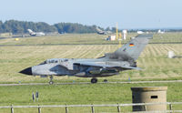 46 36 @ EGQL - JBG-32 Tornado ECR Taxiing to its dispersal,while in the back ground a pair of Tornado IDS From JBG-33 Can also be seen taxiing to their dispersal - by Mike stanners