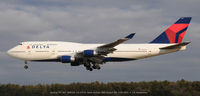 N661US @ BWI - landing on 33L - by J.G. Handelman