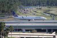 N39415 @ MCO - United 737-900 - by Florida Metal