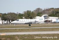 N400VK @ KSRQ - Beechcraft Beechjet (N400VK) arrives on Runway 32 at Sarasota-Bradenton International Airport following a flight from Ocean Reef Club - by Donten Photography
