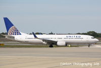 N76517 @ KSRQ - United Flight 1720 (N76517) taxis for flight at Sarasota-Bradenton International Airport - by Donten Photography