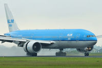 PH-BQF @ EHAM - KLM Asia Boeing B777-206/ER landing in EHAM/AMS - by Janos Palvoelgyi