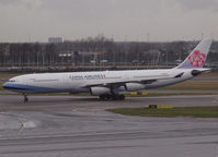 B-18807 @ AMS - Landing on runway 27 of Schiphol Airport - by Willem Göebel