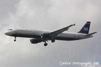N191UW @ KMCO - US Air Flight 1729 (N191UW) on approach to Orlando International Airport following a flight from Charlotte-Douglas International Airport - by Donten Photography