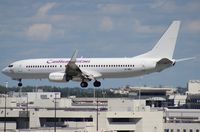 9Y-MBJ @ MIA - Caribbean 737-800 - missing tail logo