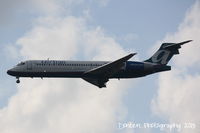 N921AT @ KMCO - AirTran Flight 20 (N921AT) arrives at Orlando International Airport following a flight from Hartsfield-Jackson Atlanta International Airport - by Donten Photography