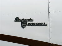N789R @ SZP - 1965 Beech S35 BONANZA, Continental IO-520-B 285 Hp, logo - by Doug Robertson