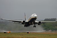 EI-DCT @ EGHH - Ryanair, clearing the runway of water! - by Howard J Curtis