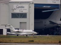 EI-MJC @ EINN - With EI-EYZ Boeing 757-2Q8 in the hangar behind. - by Carl Byrne (Mervbhx)