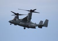 165845 - MV-22B Osprey over Cocoa Beach with storms in area
