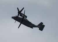 166726 - MV-22B over Cocoa Beach with nearby storms