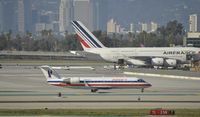 N866AS @ KLAX - Taxiing to gate at LAX - by Todd Royer