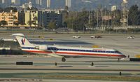 N543EA @ KLAX - Taxiing to gate at LAX - by Todd Royer