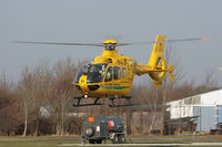 G-DORS @ EGHS - Dorset & Somerset Air Ambulance, lifting off from its base. - by Howard J Curtis