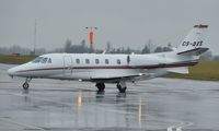 CS-DXS @ EGSH - Very wet taxyway. - by keithnewsome