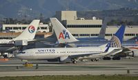 N76505 @ KLAX - Taxiing for departure at LAX - by Todd Royer