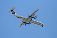 N406QX @ KPSP - Horizon Air Bombardier DHC-8-402, QXE2377 on approach for RWY 31L KPSP, arriving from from KSJC. - by Mark Kalfas