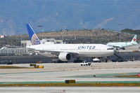N211UA @ KLAX - United Airlines Boeing 777, at the maintenance KLAX. - by Mark Kalfas