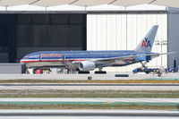 N750AN @ KLAX - American Airlines Boeing 777-223, at the AA hangar preparing for a later flight to London. - by Mark Kalfas