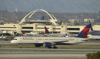 N6711M @ KLAX - Taxiing to gate at LAX - by Todd Royer