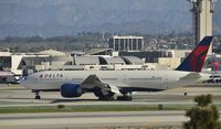 N703DN @ KLAX - Taxiing to gate at LAX - by Todd Royer