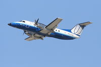 N563SW @ KLAX - SkyWest/United Express Embraer EMB-120, SKY5392  departing RWY 25R KLAX enroute to Yuma MCAS/Yuma Intl.-KNYL. - by Mark Kalfas