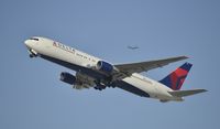 N129DL @ KLAX - Departing LAX - by Todd Royer